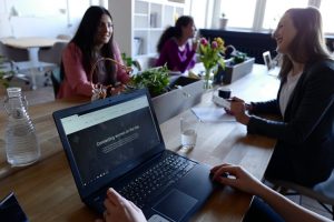 Women coworking around a table.