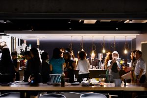 A photo of coworking members at Blink Tokyo enjoying a community event.