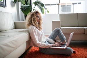 A woman working from home.