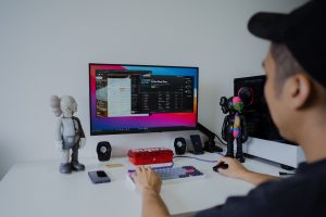 A man working from his laptop at home.