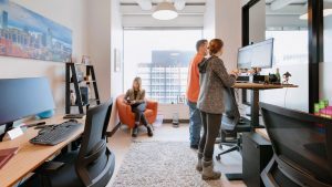 A group of people working in a flexible workspace.