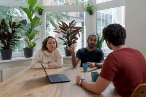 A group of people working from a coworking space.