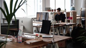 A workspace with several desks.