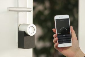 A smart security lock on a door.