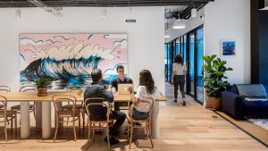 A group of people working from a coworking space.