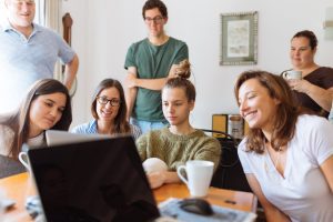 A group of people working from a coworking space.