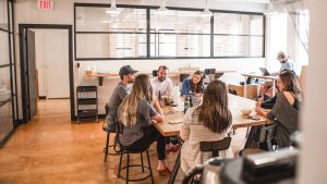 A group of people working from a coworking space.