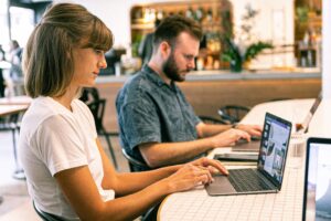 A view of two people in a coworking space.