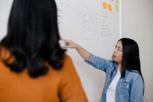 An image of two people in a coworking space.