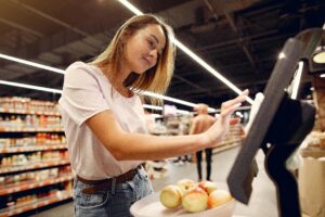 A view of a woman shopping for food.